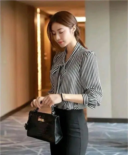 Sufiyana Ámour's Black and White Striped Crepe Top