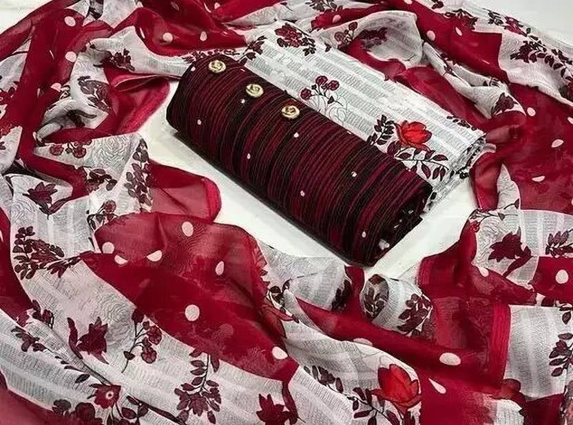 Red and white patterned fabric with a roll of red and white fabric on top