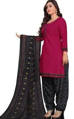 Woman wearing a pink kurta with black patiala and dupatta on a white background