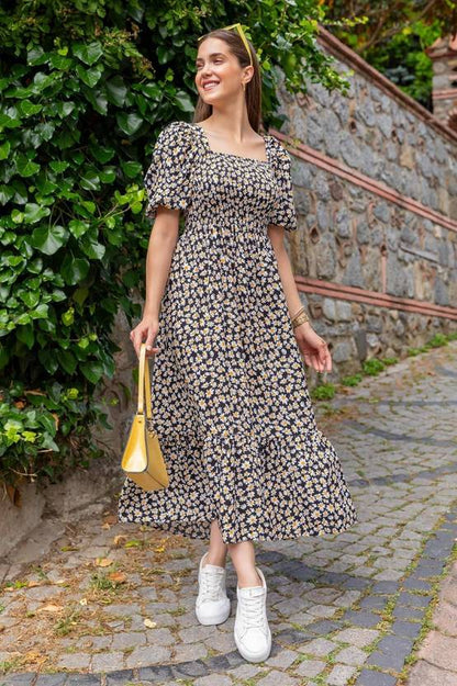 Sufiyana Ámour's Black Daisy Print Crepe Midi Dress for Women
