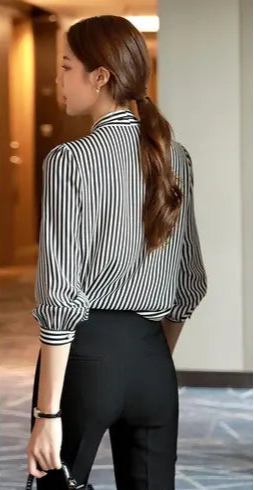 Sufiyana Ámour's Black and White Striped Crepe Top